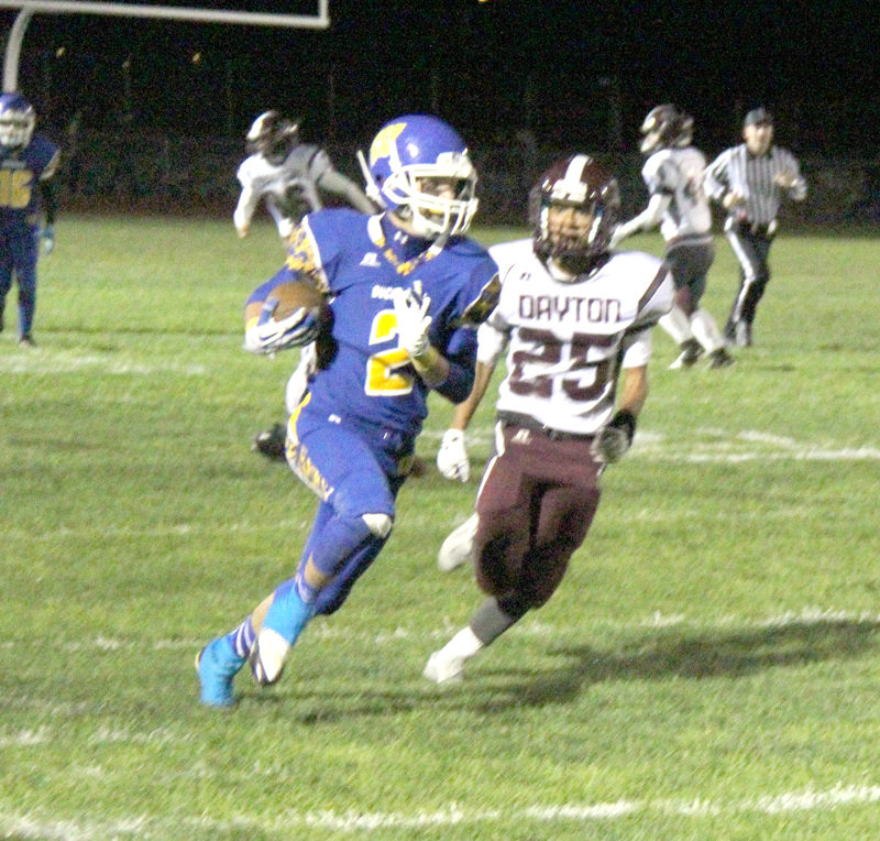 Nate Nelson runs the ball./Aimee Brandon • The Brand