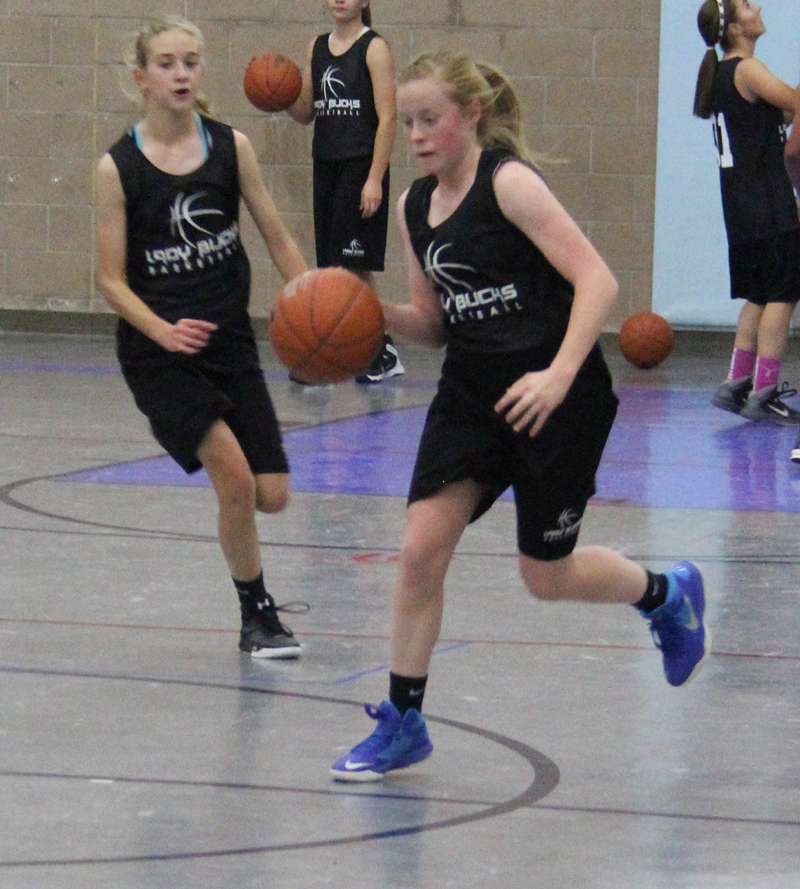 Macy Munroe dribbles the ball./Brody Goucher • The Brand