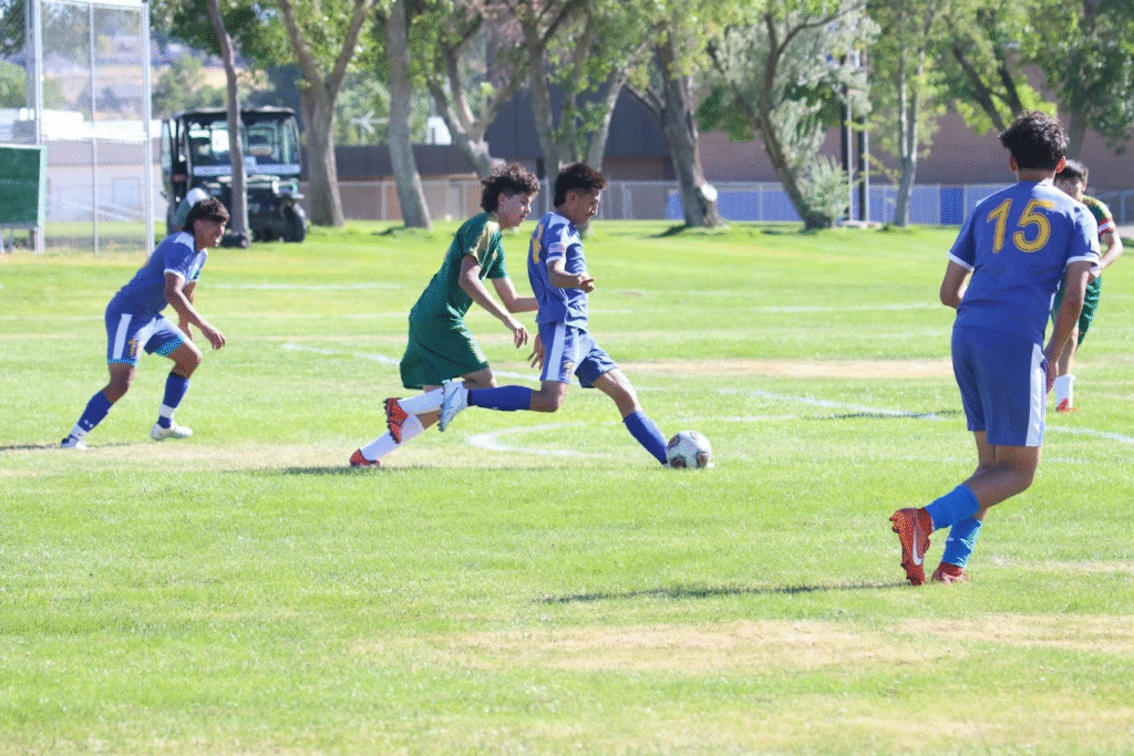 Jonathan Prado takes a shot on goal against Battle Mountain. / Ron Espinola • The Brand
