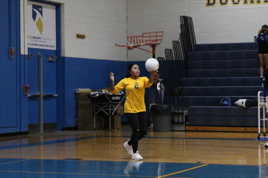 Elma serves the ball for an ace. / Ron Espinola • The Brand
