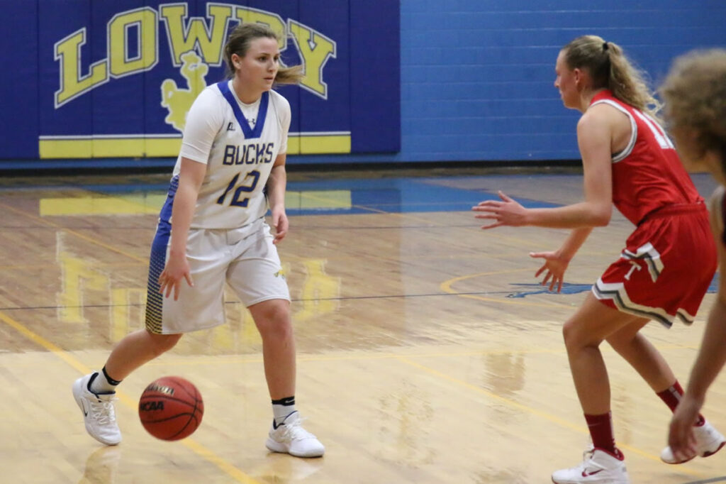 Sydney Connors looks for an open teammate during the Truckee game / Ron Espinola • The Brand