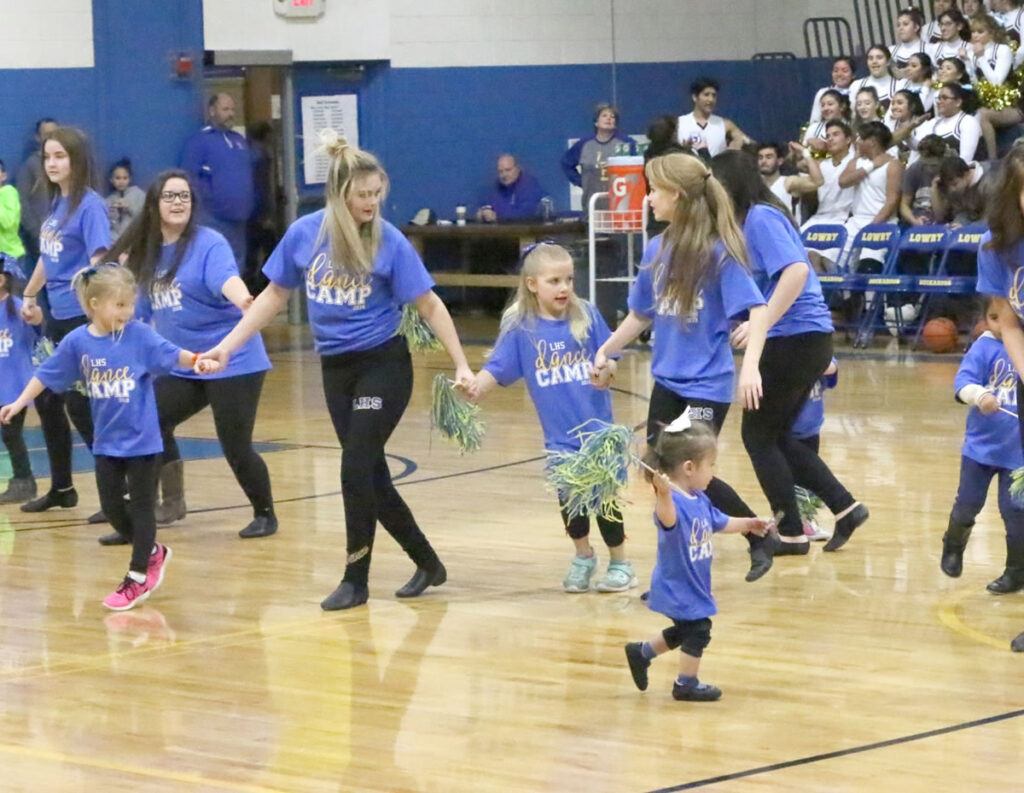The dance team with members of the Little Bucks./Julianna Gonzalez • The Brand