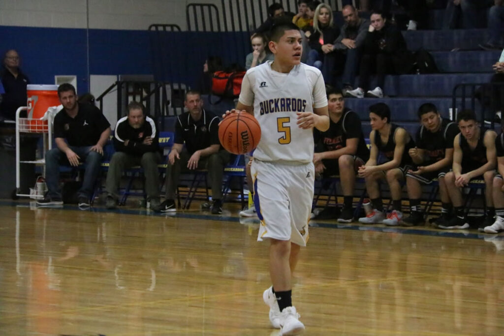 Point guard, Domonick Solis take the ball down the court./Peyton Capellen • The Brand