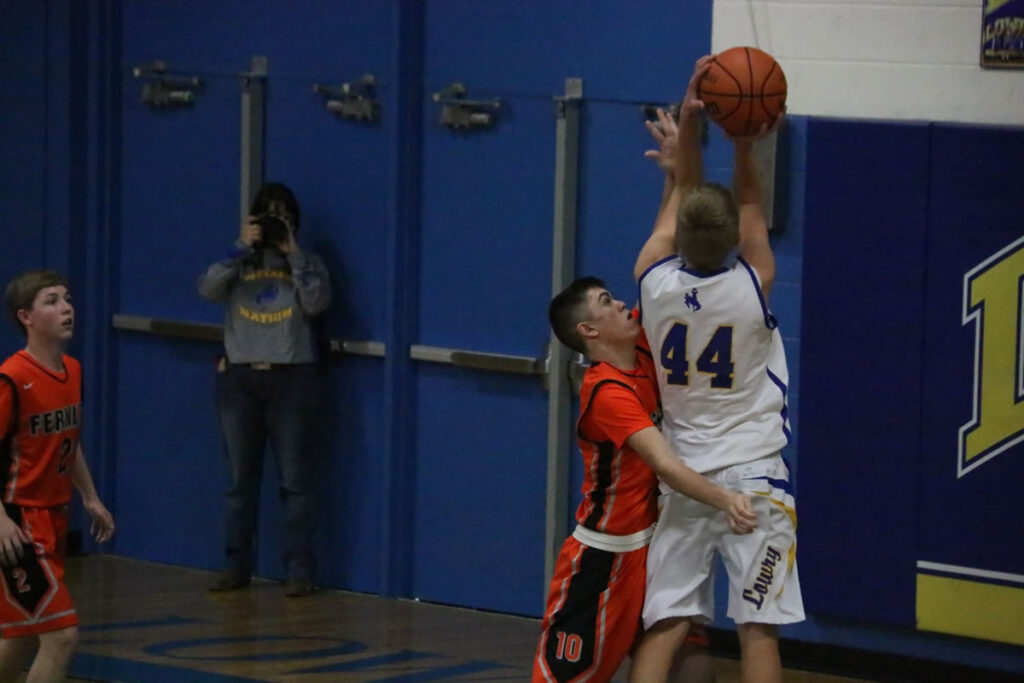 Klay Garner jumps up and attempts to make a shot./ Peyton Capellen • The Brand