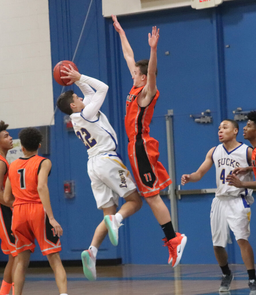 Sam Roth tries to get a shot over a Fernley player./Ron Espinola • The Brand