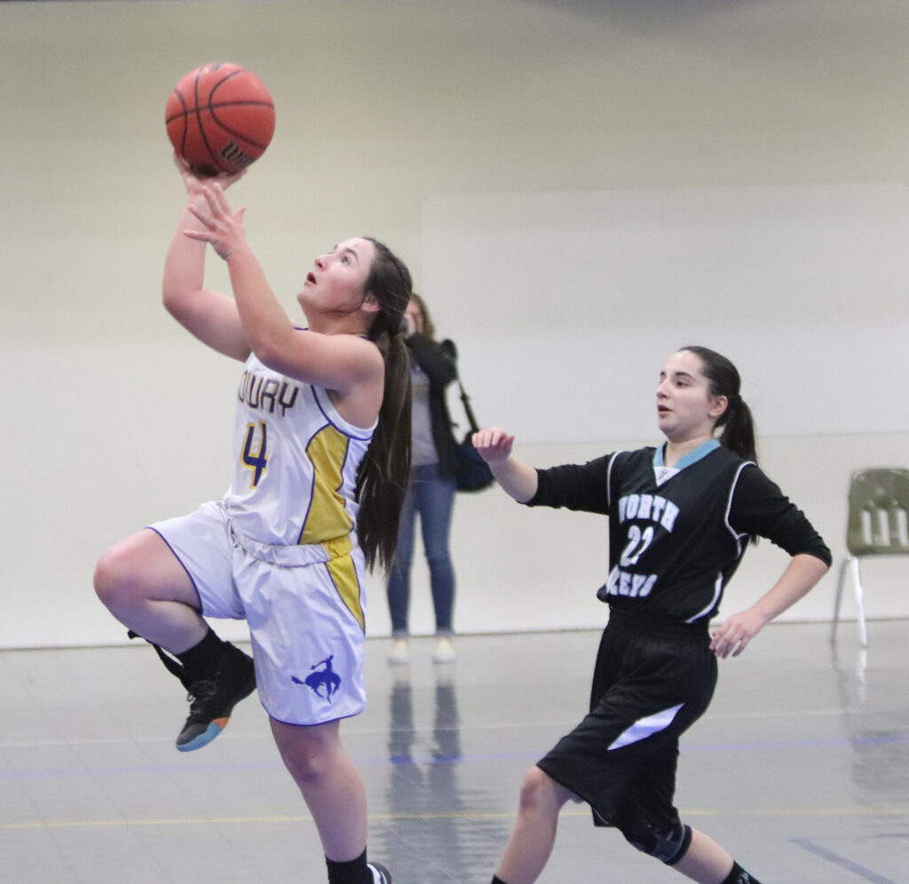 Amanda Draper goes in for a layup./Ron Espinola • The Brand