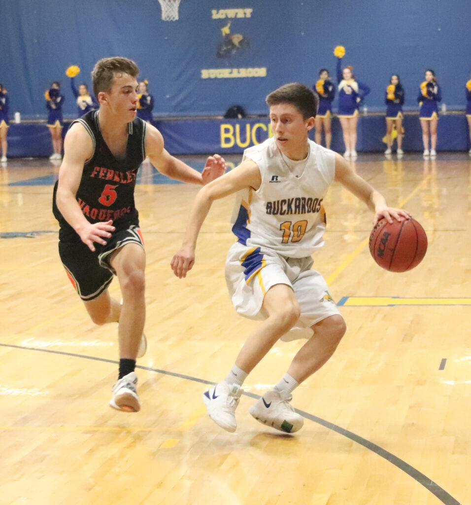 Derek Espinoza makes his way down the court./Ron Espinola• The Brand