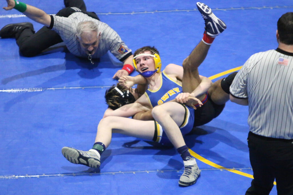 James Rackley controls his opponent./Chuckie Wiggins • The Brand