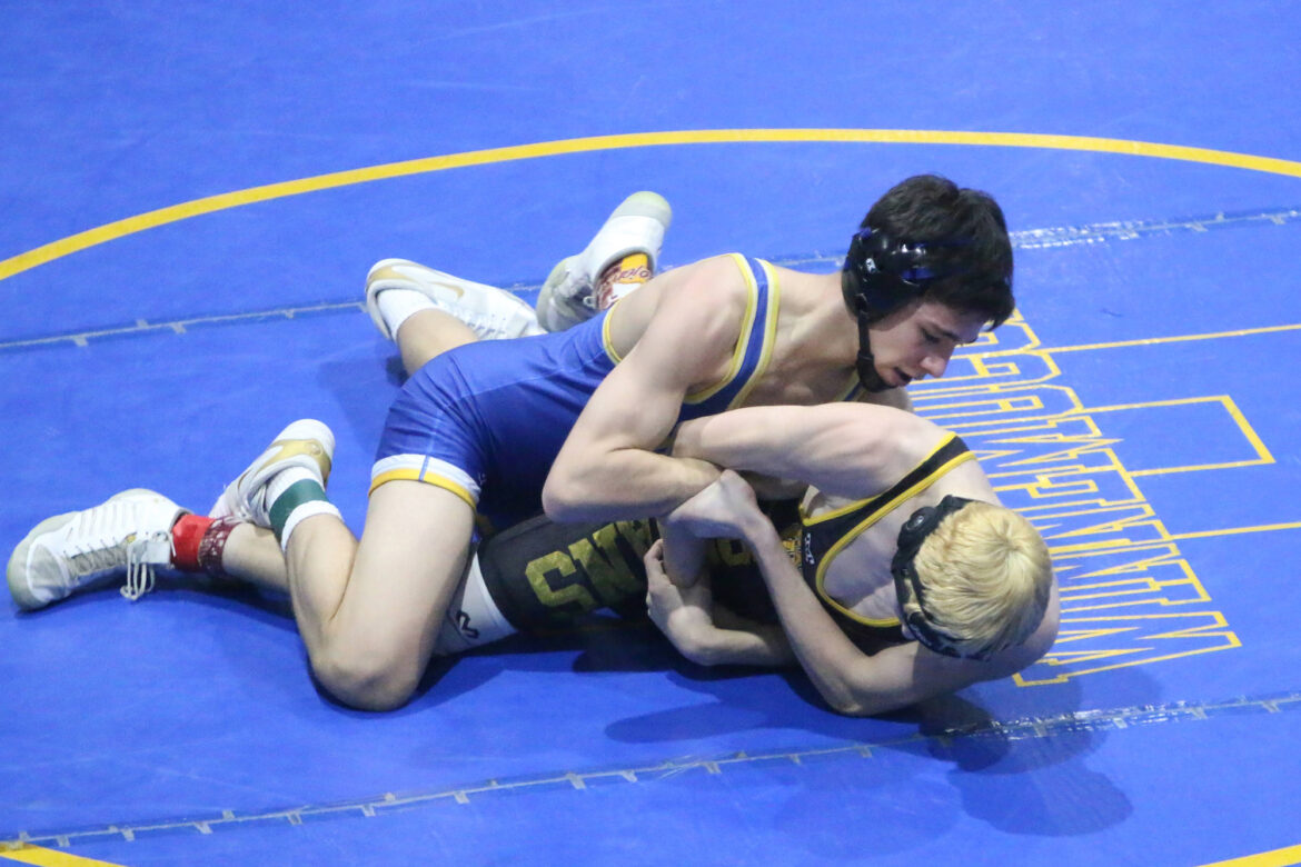 Wrestling hosts state, finishes 5th