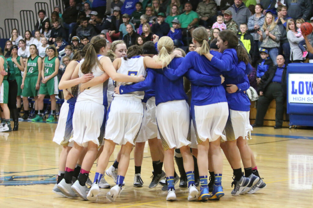 The Lady Bucks pre-game huddle./Dylan Kalkoske• The Brand
