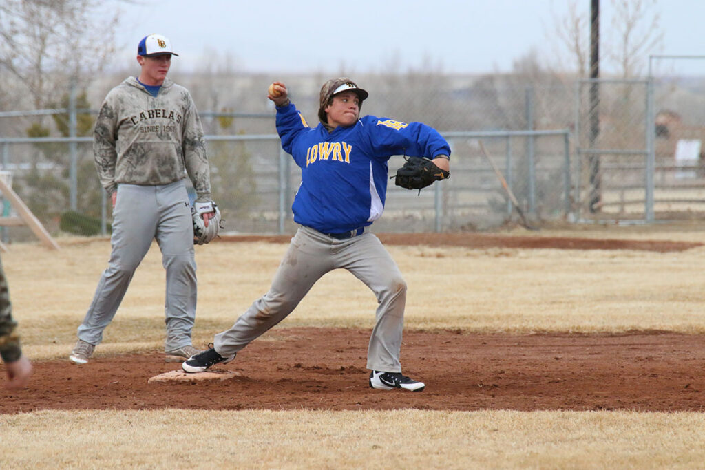 Matthew Garrison throwing the baseball./ Ron Espinola • The Brand