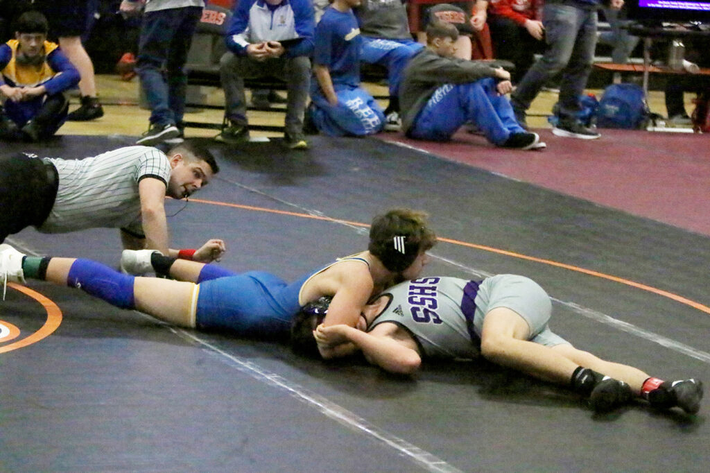 Damon Fetty pins down opponent from Spanish Springs. /Courtesy • Alexis Mattson