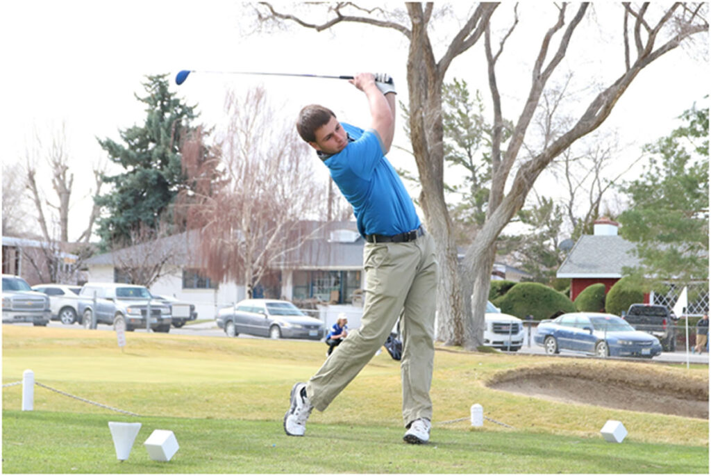 Kobe Stoker tees off on hole 8 in the home tournament/Dylan Kalkoske • The Brand