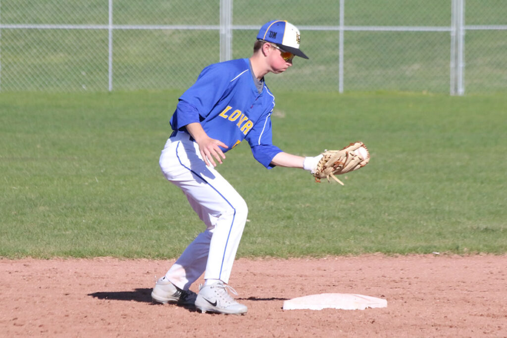 Brooks Bergenheier fielding a ball at shortstop./ Ron Espinola • The Brand