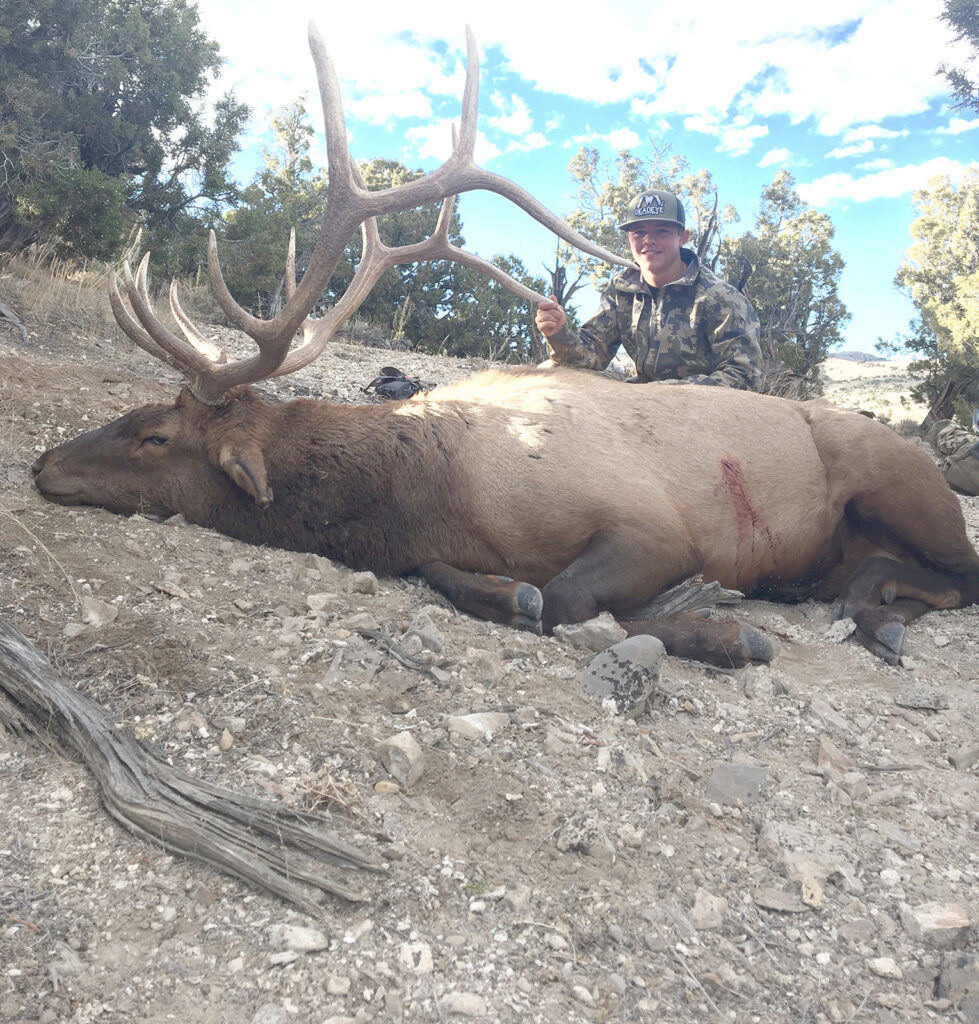 Ridge Ricketts with an elk he shot. /Courtesy • Ridge Ricketts