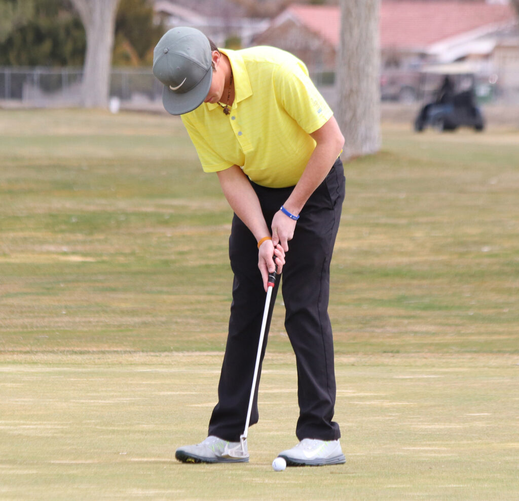 Dillon Patterson putts the ball in./Mackie Grady • The Brand