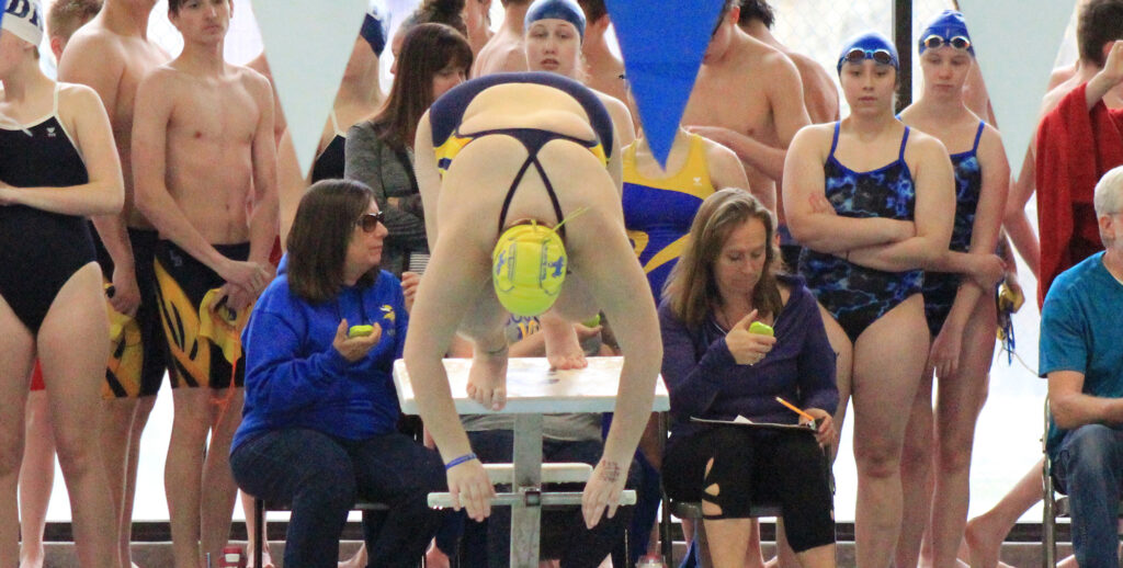 Mackie Grady dives into the water. /Courtesy • Tim Grady