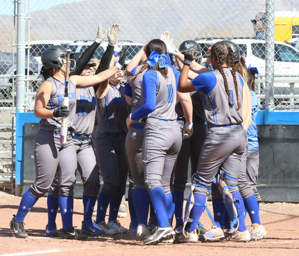 The team celebrates another homerun./The Brand • Ron Espinola