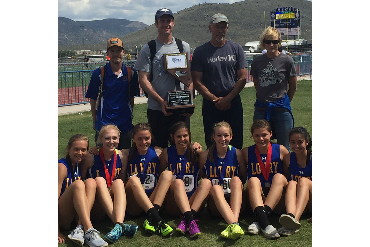 Lowry girls take a picture with trophy after winning state. /Courtesy • Michelle Garrison