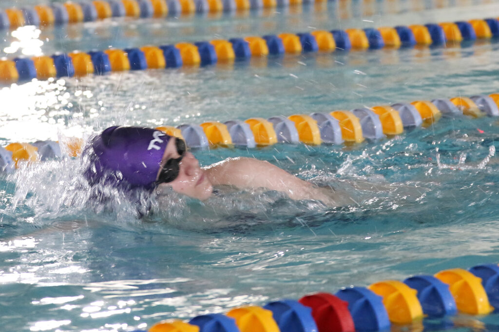 Charles Gonin swims./Ale Ibarra • The Brand