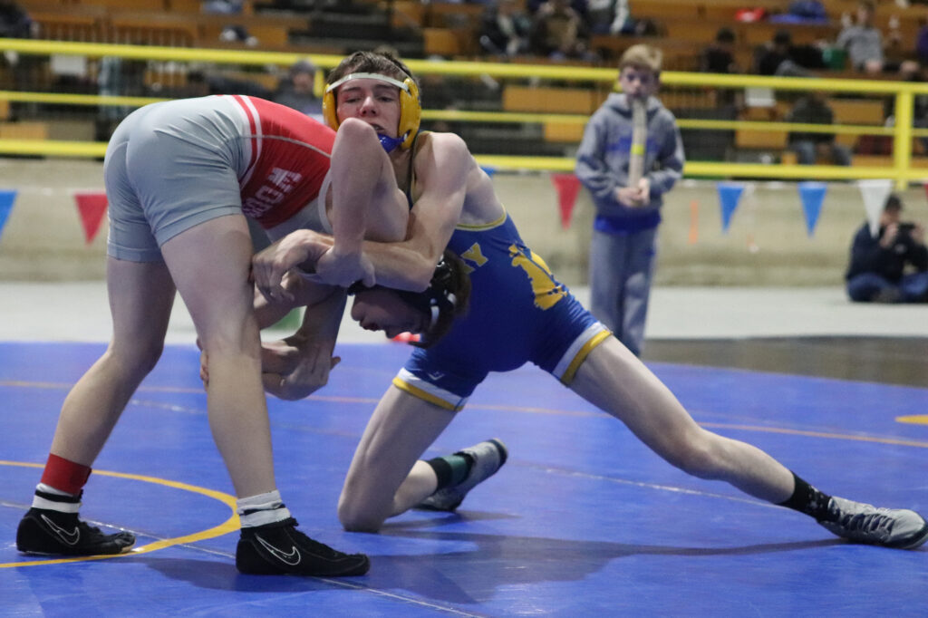 Jimmy Rackley wrestles at the Cody Louk Tournament./Ron Espinola • The Brand