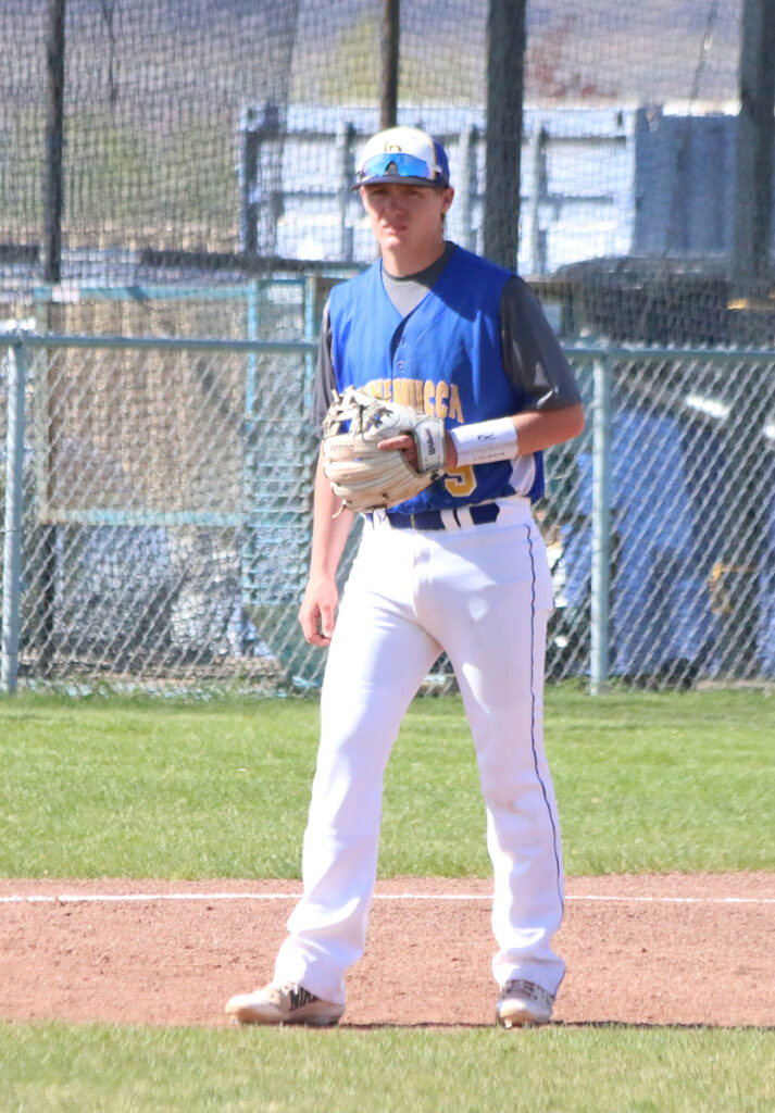 Riley Sakurada gets ready at third base./Ron Espinola • The Brand