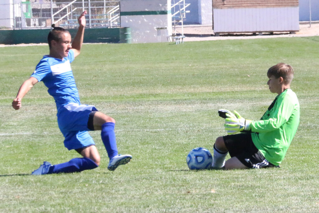 Nico Espinola's shot is blocked by the goalkeeper./Tina Espinola • The Brand
