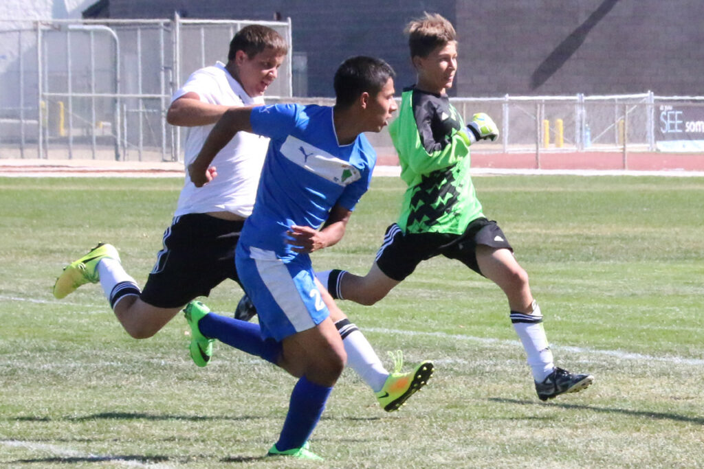 The team celebrates a goal./Tina Espinola • The Brand