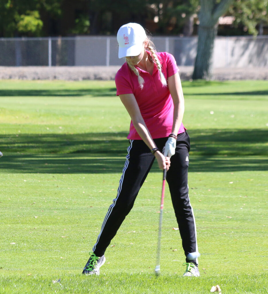 Trista Furrh approaching the green./Dylan Kalkoske • The Brand