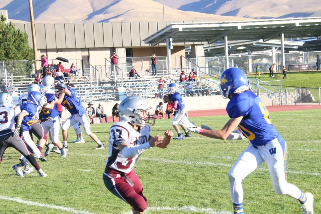 Freshman football in action./Samm Sharp • The Brand