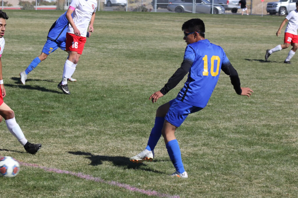 Aldahir Hernandez sends the ball to a teammate./ Chuckie Wiggins • The Brand