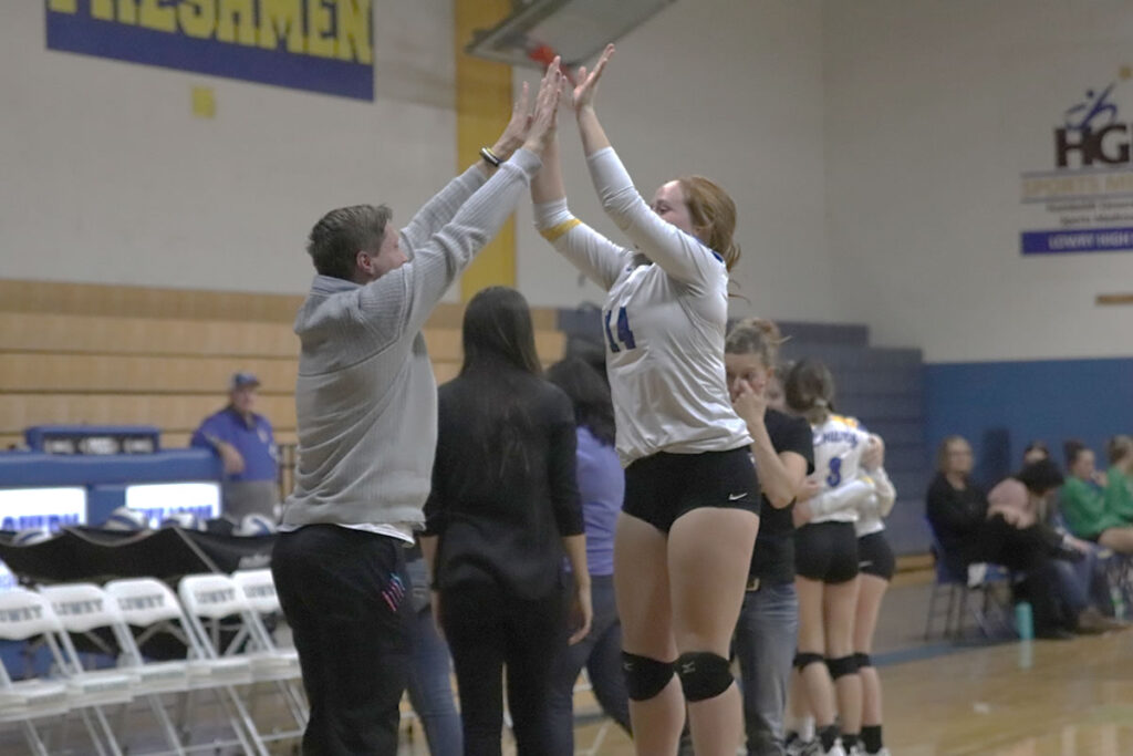 Coach Eastman and junior captain Sierra Maestrejuan do their pregame ritual./Mackie Grady • The Brand