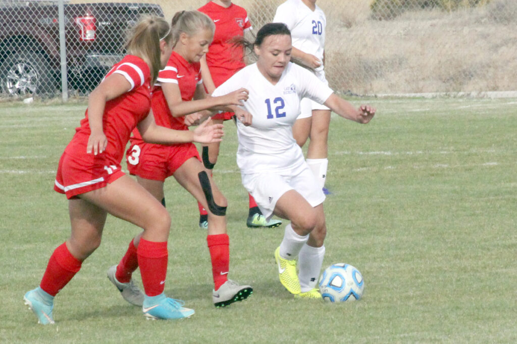 Angelica Guzman fights for the ball./Ron Espinola • The Brand