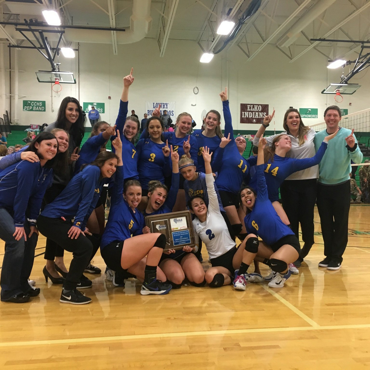 The Lady Bucks celebrate their Zone championship Eastman sets the ball./Victor Castaneda • The Brand