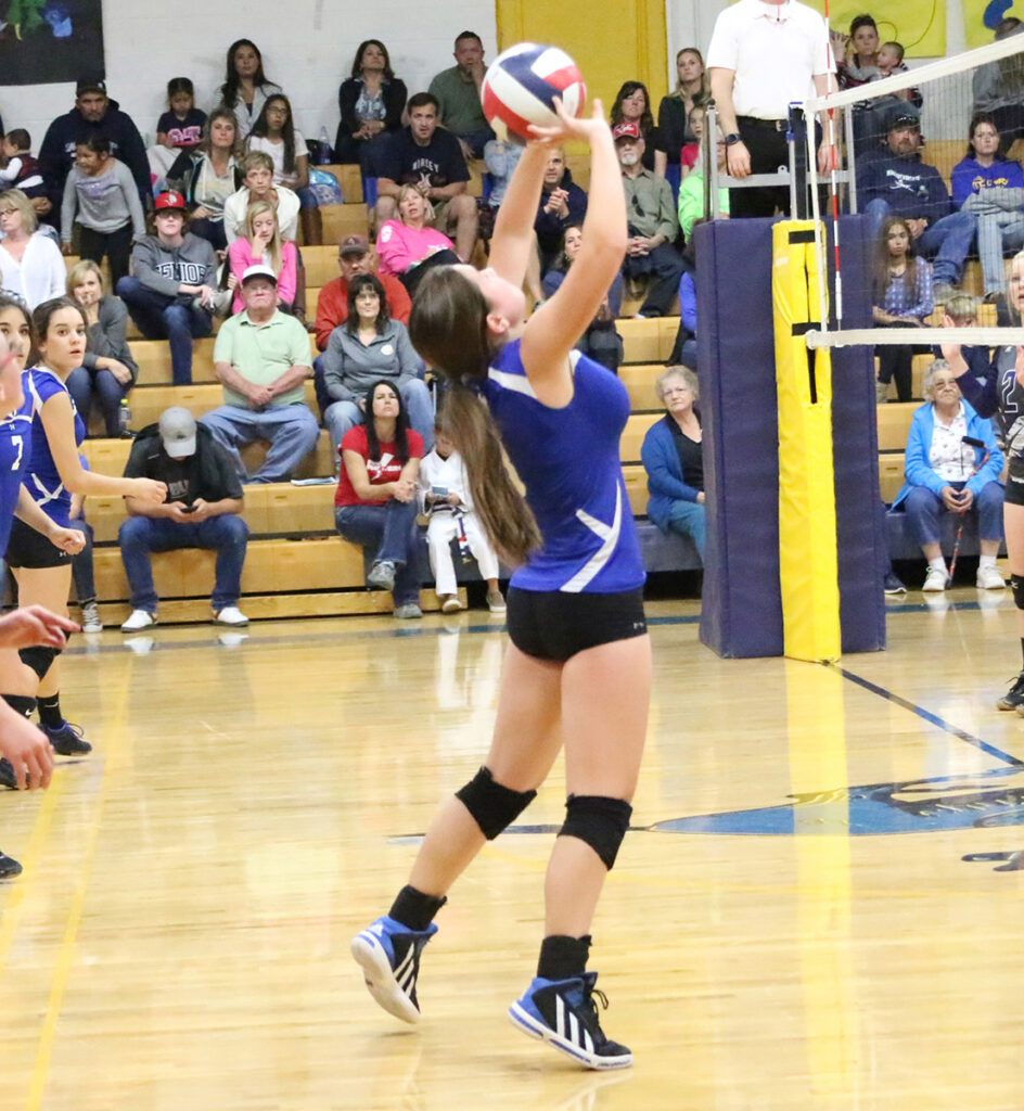 Stacy Horton sets the ball./Ron Espinola • The Brand