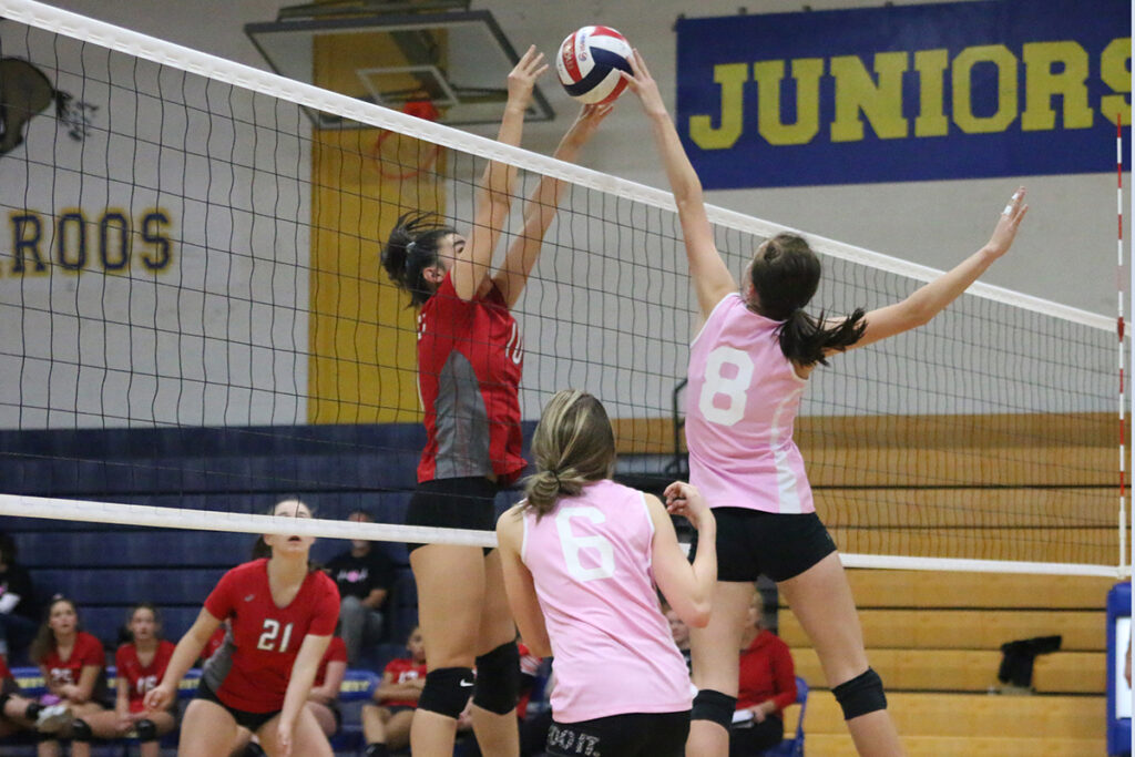 Alexis Olsen blocks and opponent./Taylor Gleason• The Brand