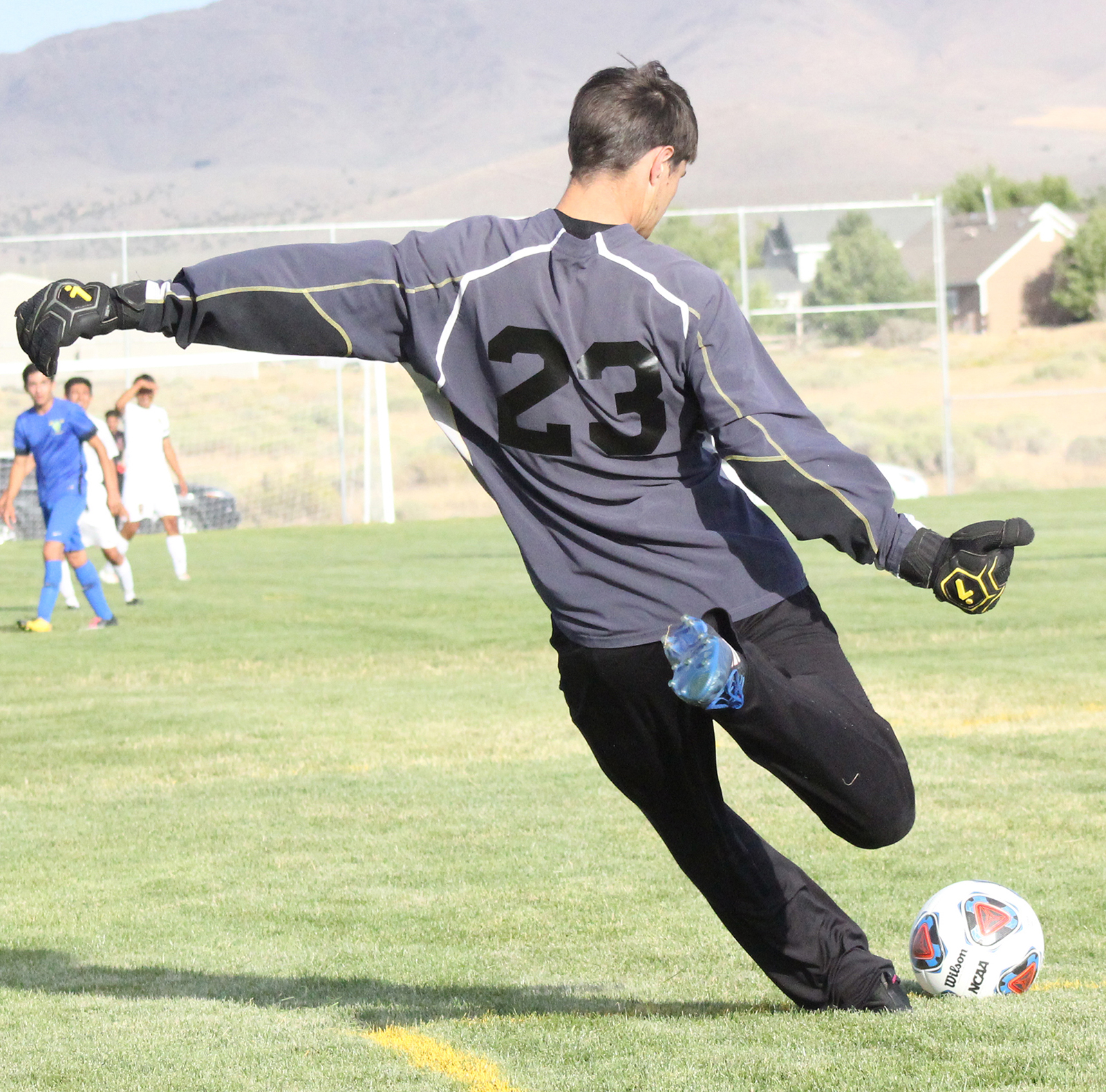 Chris Schultz performs a goal kick./Ron Espinola • The Brand