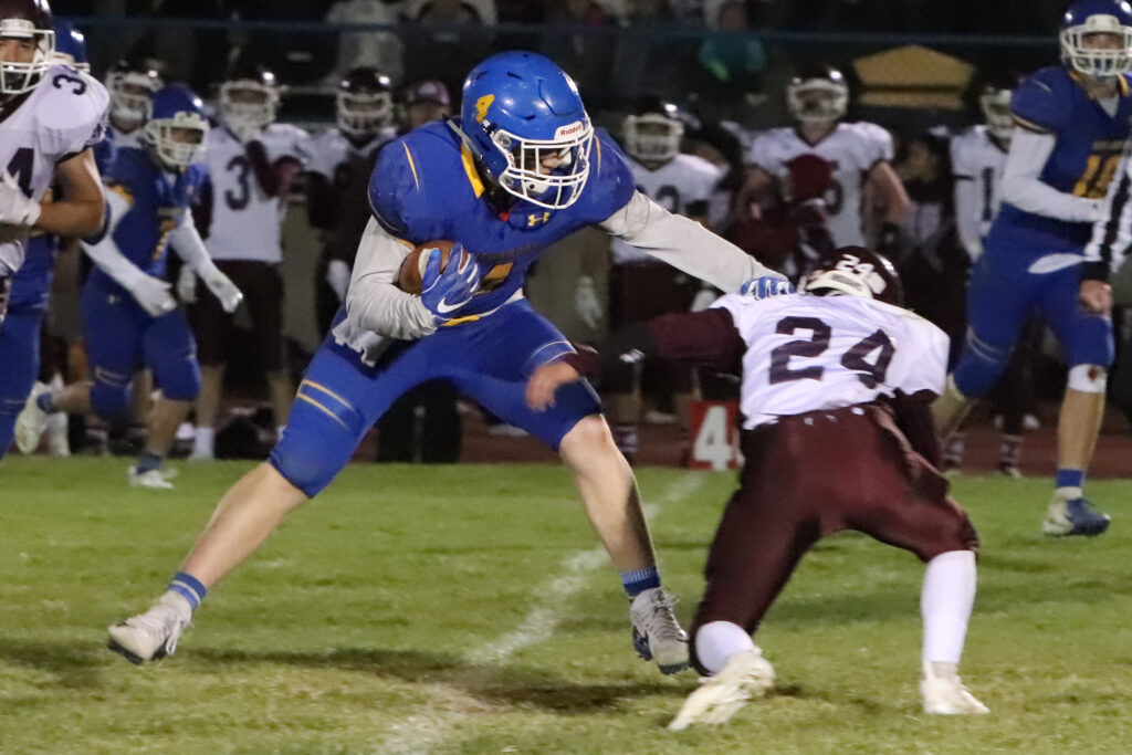 Preston Snow runs a play against Sparks./Ron Espinola • The Brand