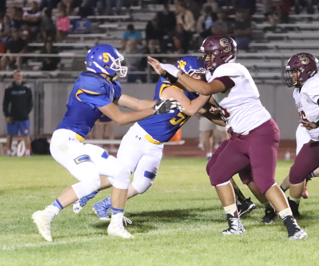 JC O'Neil blocks a Sparks player. /Ron Espinola • The Brand