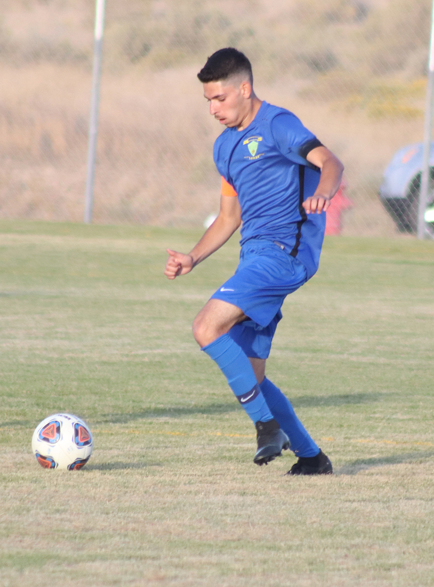Captain Alex Herrera controls the ball./Ron Espinola • The Brand 