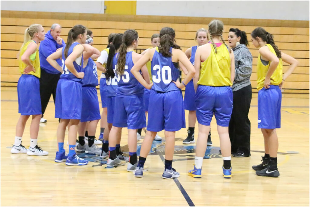 Coach Cabatbat lectures team./ Ron Espinola • The Brand