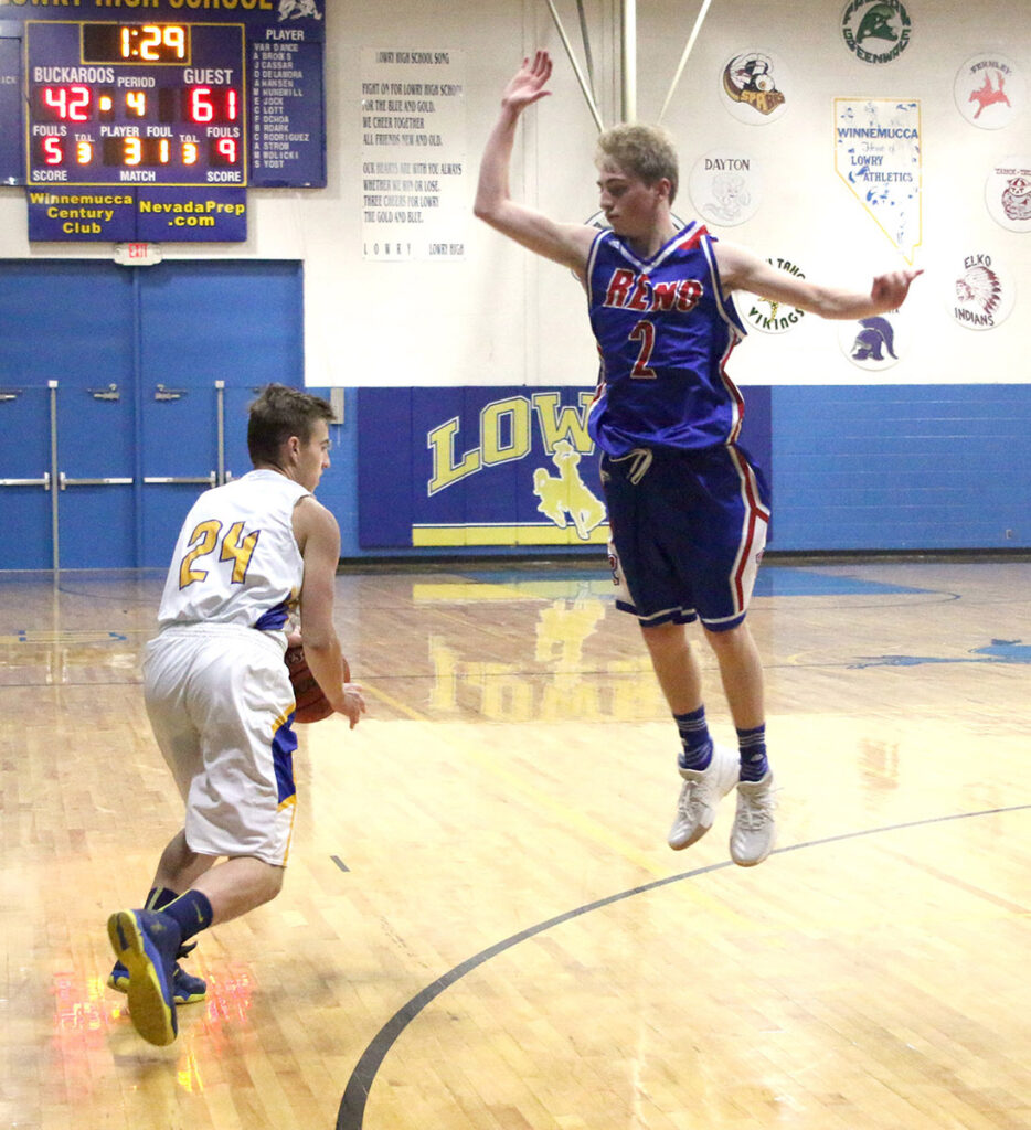 Shai Welsh drives around a defender../Celest Castellanos • The Brand