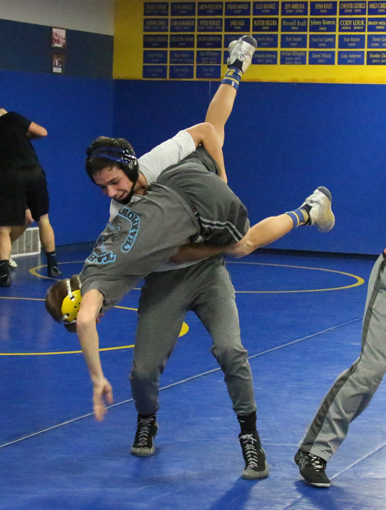 Taylor Corak throws down his teammate./Ron Espinola • The Brand