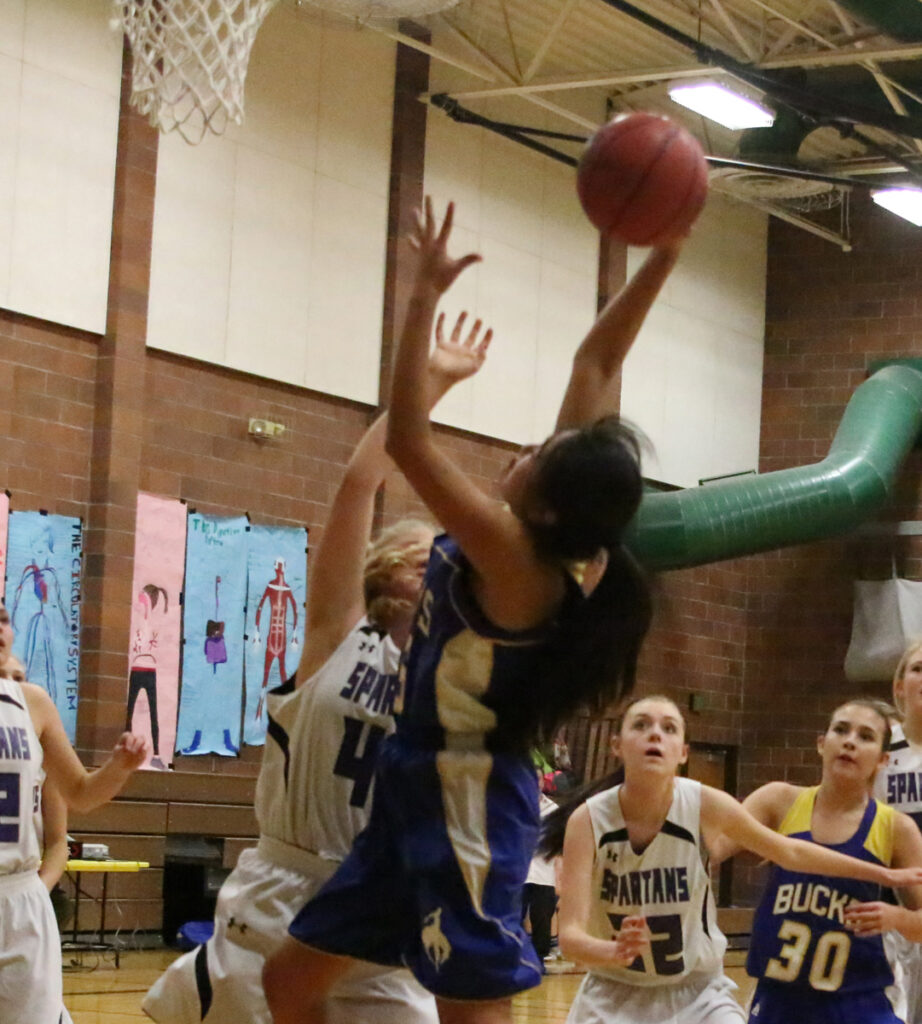 Going for a layup./Aimee Brandon• The Brand