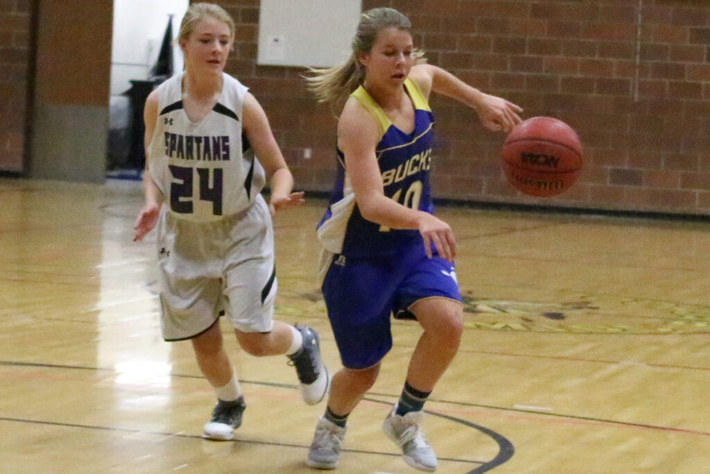 Kelcey Cooper goes after a loose ball./Aimee Brandon • The Brand