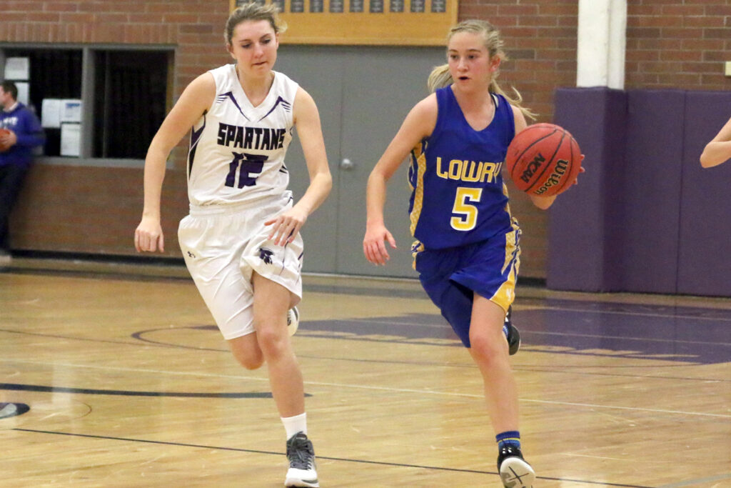 Hailey Fernandez dribbles the ball./ Aimee Brandon • The Brand
