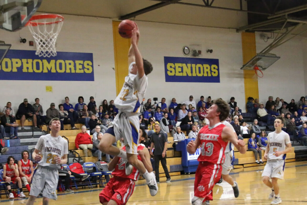 Varsity shows off first dunk of season