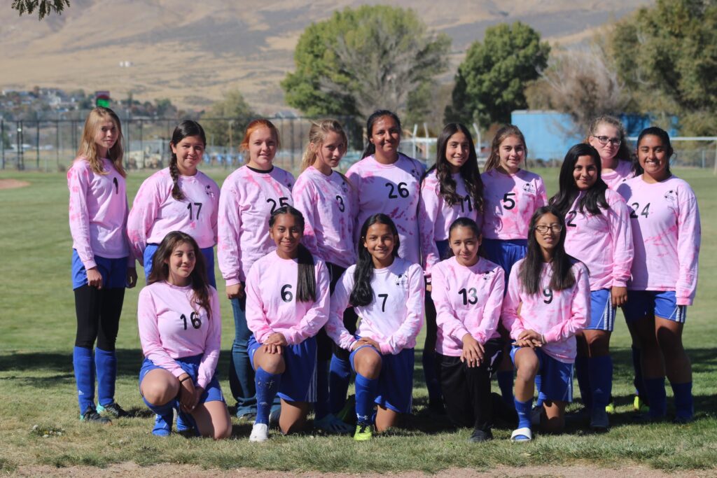 The JV Lady Bucks pose after their Pink Game./Clarissa Olson  • The Brand