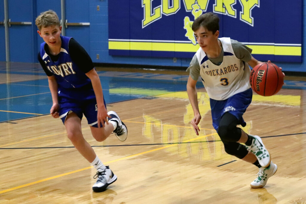 Travis Urain makes a break down the court./Ron Espinola • The Brand