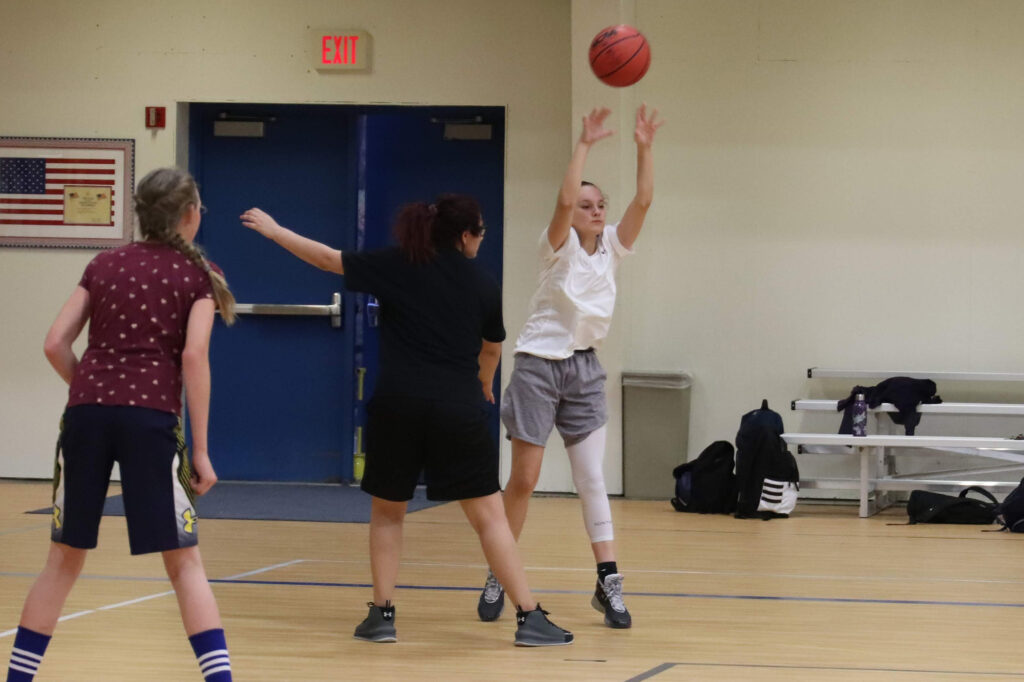 Cali Keith passes the ball./Ron Espinola • The Brand